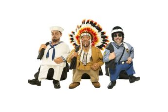 The Quiddlers comedy group as tiny people in sailor, chief and police costumes