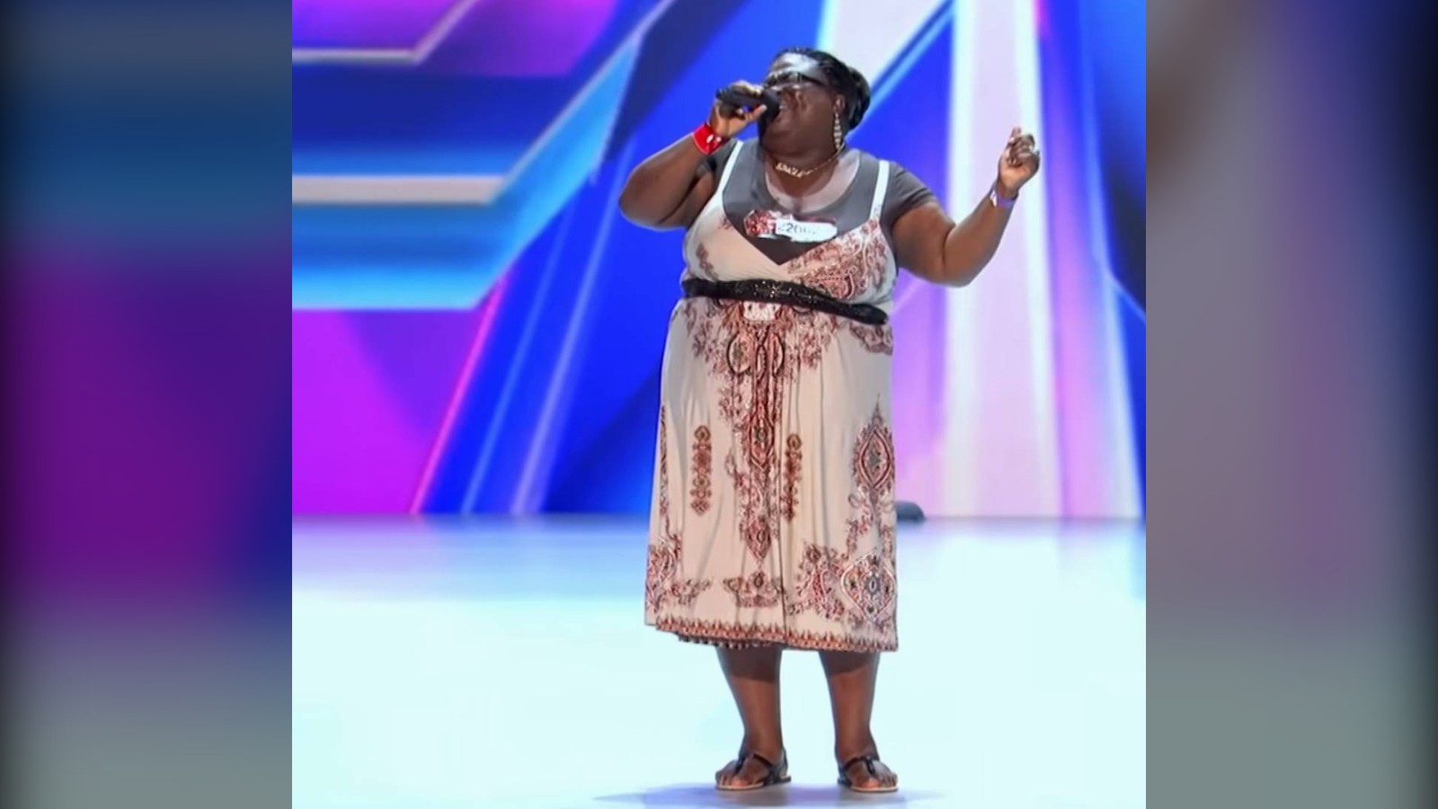 Panda Ross singing on stage