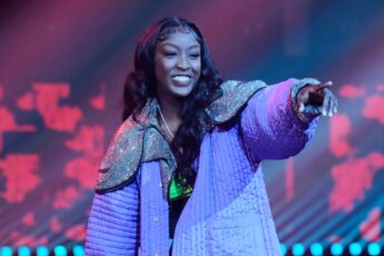 Flau'jae performing on stage
