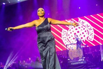 Janice Robinson singing on stage