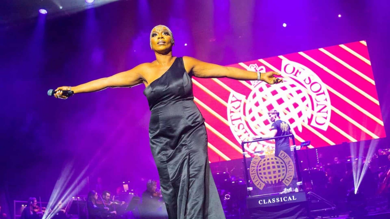 Janice Robinson singing on stage